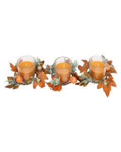 Decorative candle with Christmas motifs, orange color with leaves, D. 5.5 x H. 6.5 cm